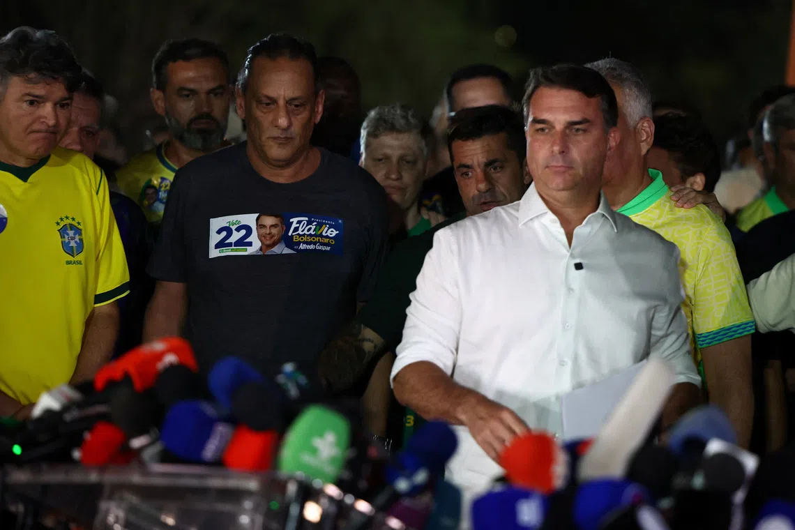 Brazilian presidential candidate Flavio Bolsonaro of the Liberal Party (PL) arrives to speak after losing the presidential runoff election, in Brasilia, Brazil October 25, 2026. REUTERS/Agustin Marcarian