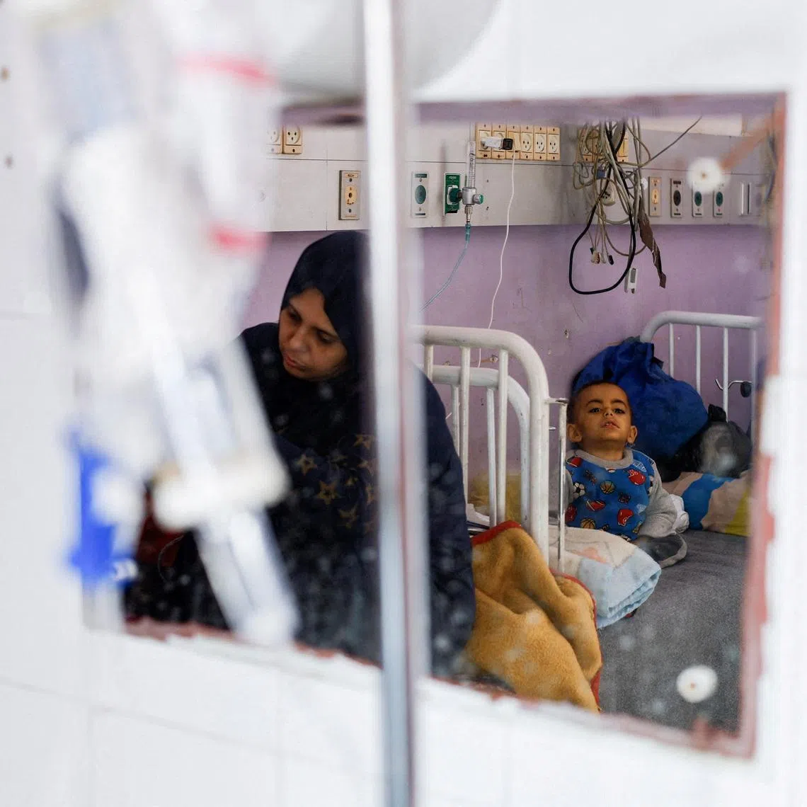 FILE PHOTO: A Palestinian boy, Nidal Abu Rabee, receives treatment at Al-Aqsa Martyrs Hospital, in Deir al-Balah, central Gaza Strip, February 2, 2026. REUTERS/Mahmoud Issa/File Photo/File Photo