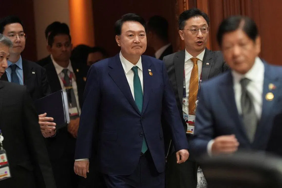 South Korean President Yoon Suk-yeol, center, arrives to the ASEAN-South Korea Summit at the Association of the Southeast Asian Nations (ASEAN) Summit in Jakarta, Indonesia, September 6, 2023. Tatan Syuflana/Pool via REUTERS