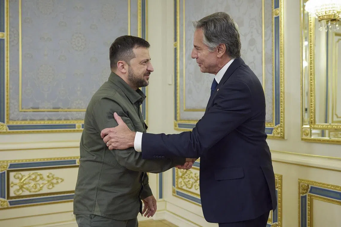 Ukraine's President Volodymyr Zelensky (left) welcomes US Secretary of State Antony Blinken to Kyiv.