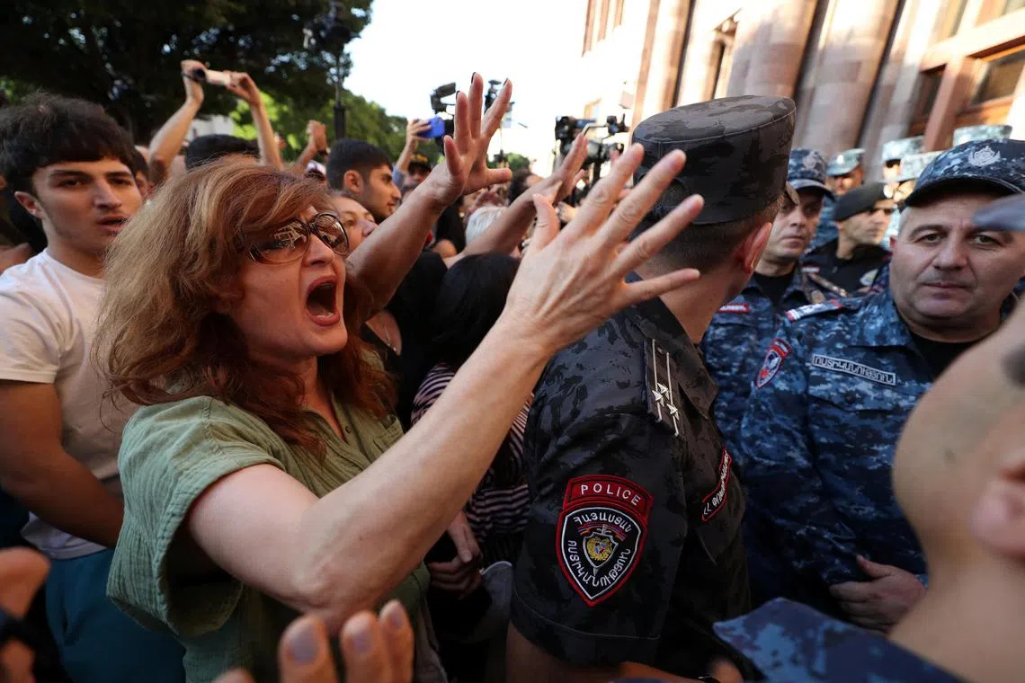Protesters gather near the government building, after Azerbaijan launched a military operation in the region of Nagorno-Karabakh, in Yerevan, Armenia, September 19, 2023. Vahram Baghdasaryan/Photolure via REUTERS ATTENTION EDITORS - THIS IMAGE HAS BEEN SUPPLIED BY A THIRD PARTY.