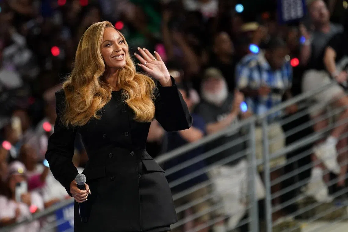 Singer Beyonce waves as she attends a campaign rally of Democratic presidential nominee Kamala Harris, in Houston, Texas, US, on Oct 25.