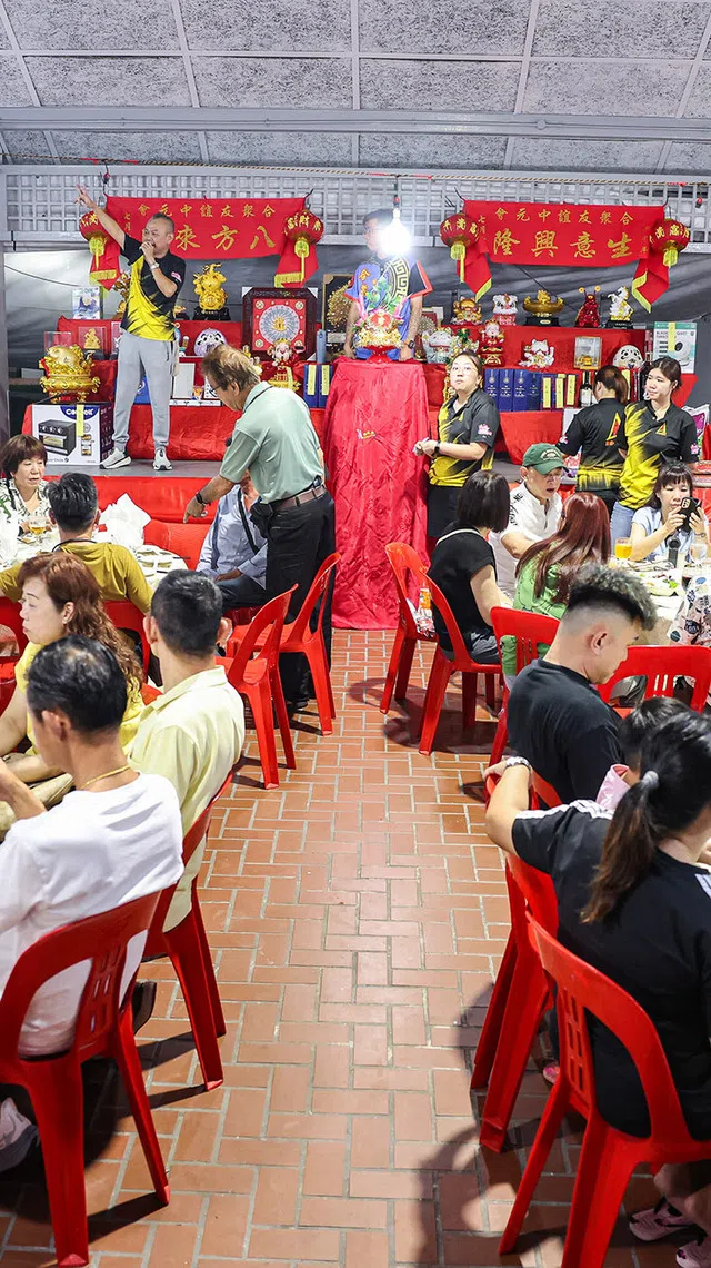 The auction in progress during the Hungry Ghost Festival dinner in Toa Payoh on Aug 23, 2026. ST PHOTO: BRIAN TEO