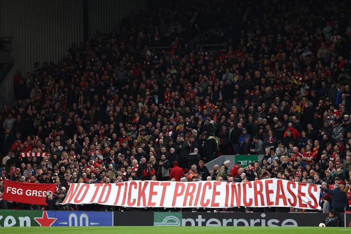 Liverpool fans protest against the planned ticket price rise at Anfield.