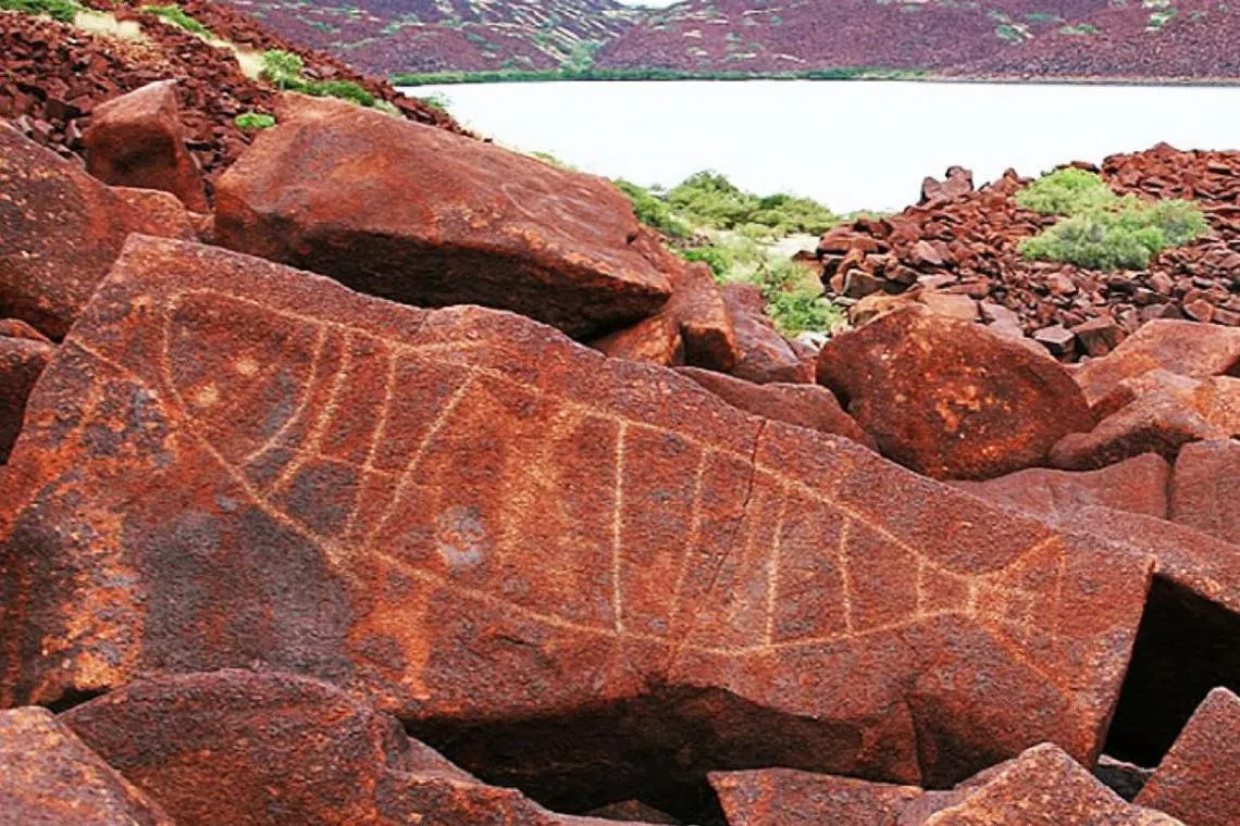 The art, thought to be 50,000 years old, lies in a peninsula that has gas and explosives plants.