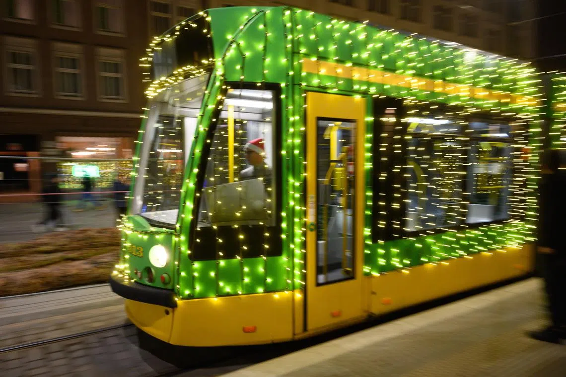 A tramway is decorated with Christmas lights in Poznan, Poland, 01 December 2022.  