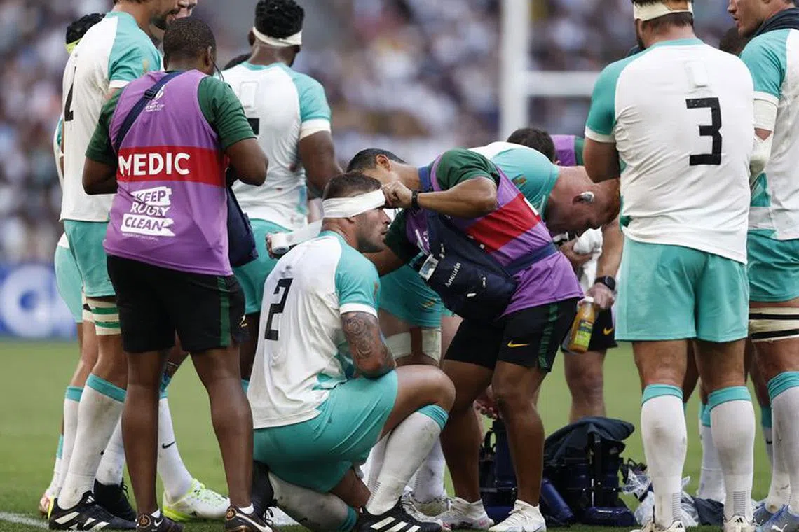 Rugby Union - Rugby World Cup 2023 - Pool B - South Africa v Scotland - Orange Velodrome, Marseille, France - September 10, 2023 South Africa's Malcolm Marx receives medical attention after sustaining an injury REUTERS/Benoit Tessier