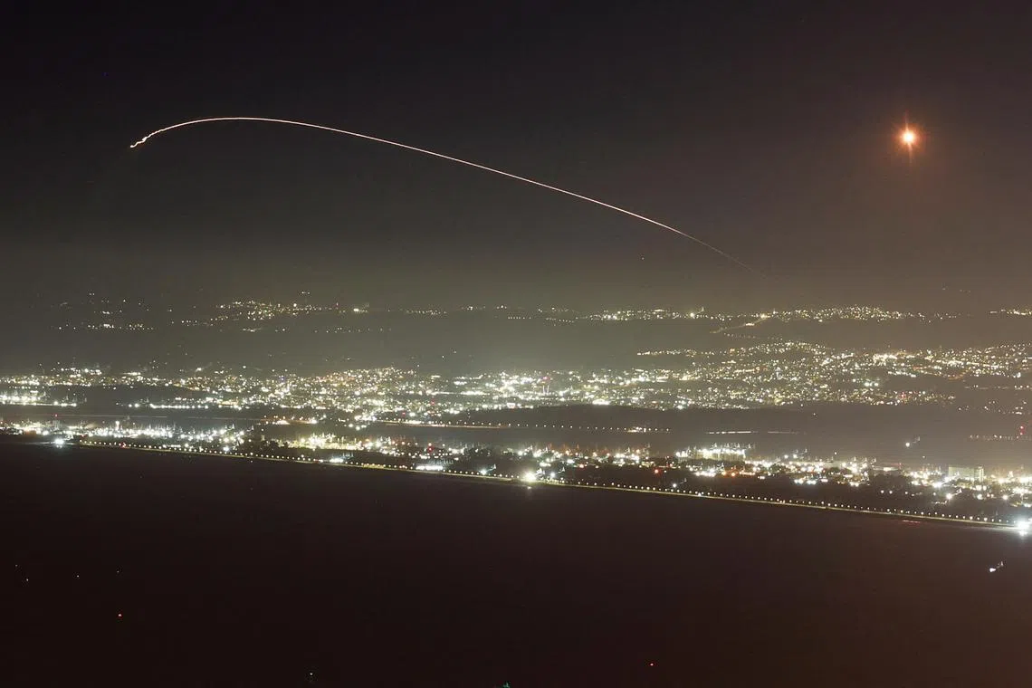 Israel's Iron Dome anti-missile system operates for interceptions as rockets are launched from Lebanon towards Israel, amid hostilities between Hezbollah and Israel, as seen from Haifa, Israel, October 3, 2024. REUTERS/Ammar Awad