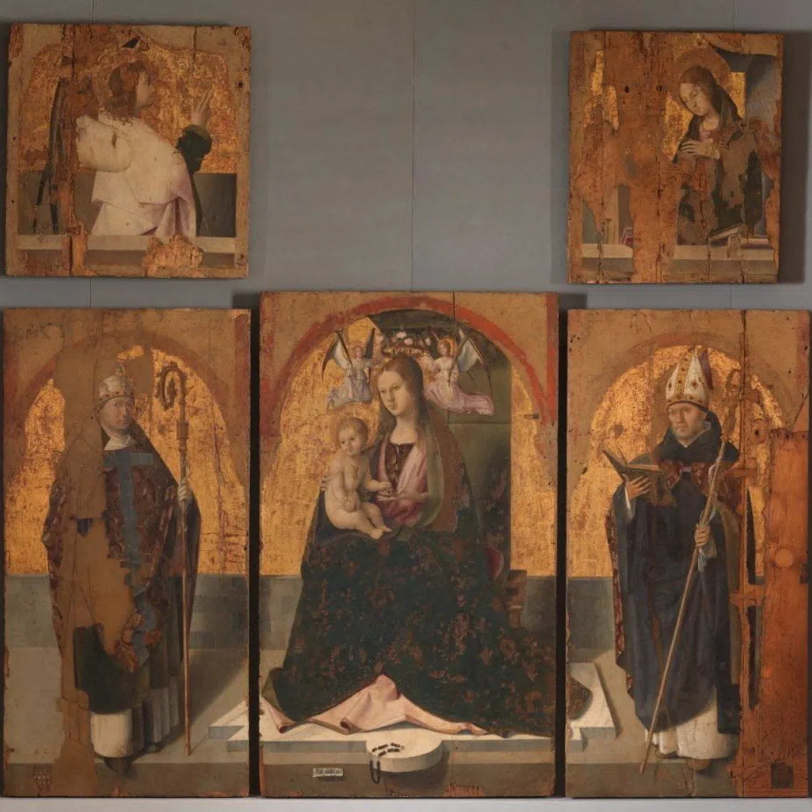 The thieves took three of five remaining panels (above) that made up an altarpiece known as Polittico di San Gregorio.