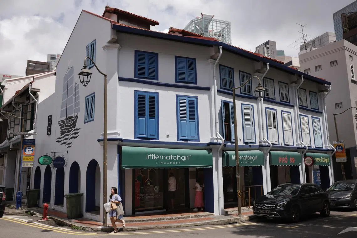 The row of shophouses (from left) at 55, 56, 57 and 58 Amoy Street. Mr Can Heng, who runs Little Match Girl, had renewed his tenancy for another three years from 2023.