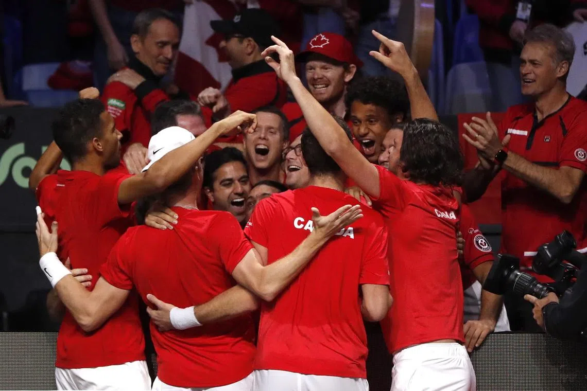 Canada celebrating after Vasek Pospisil and Denis Shapovalov defeated Germany's Kevin Krawietz and Tim Puetz in the Davis Cup quarter-finals doubles match in Malaga on Nov 24.
