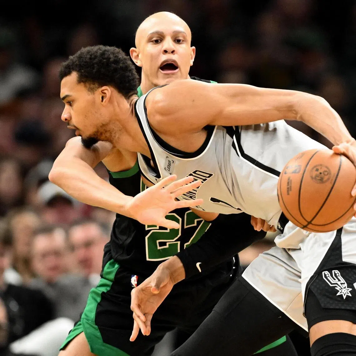 Boston Celtics guard Jordan Walsh trying to stop San Antonio forward Victor Wembanyama during the Spurs' 100-95 win on Jan 10.