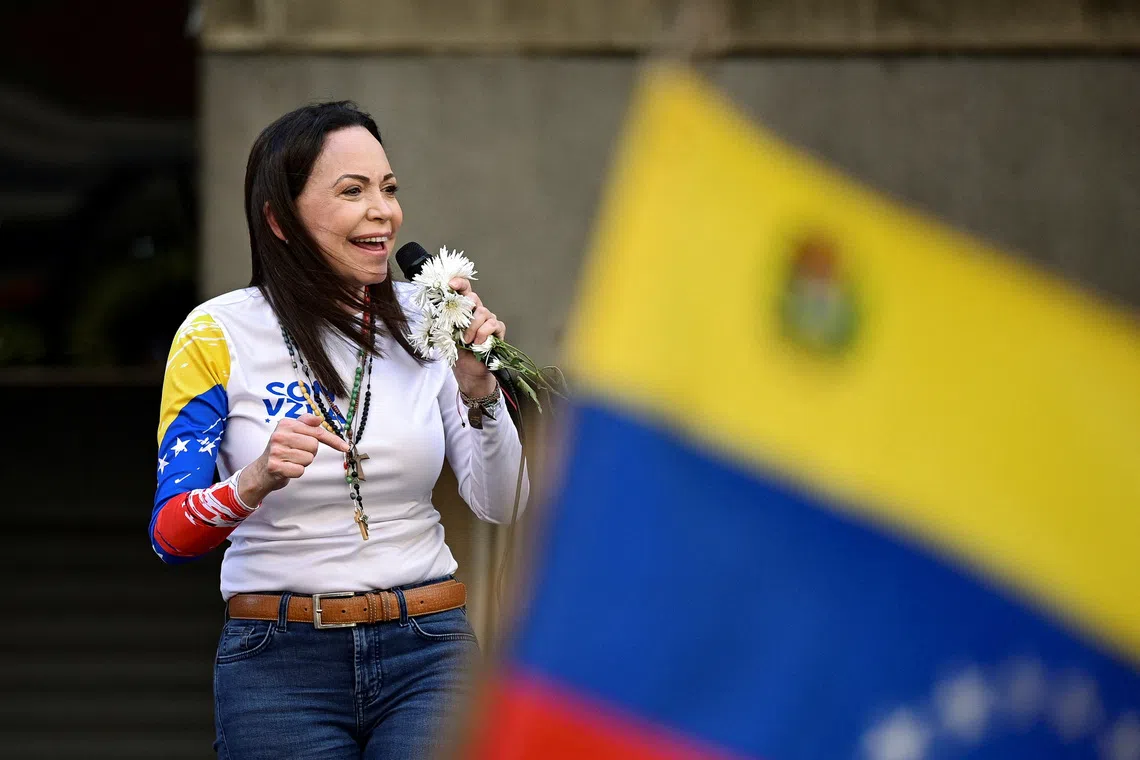 Venezuelan opposition leader Maria Corina Machado addresses supporters at a protest in Caracas, Venezuela January 9, 2025. REUTERS/Gaby Oraa