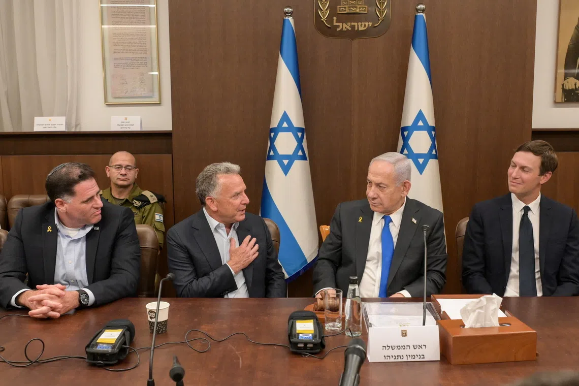 Israeli Prime Minister Benjamin Netanyahu (second from right) meeting with US President Trump's special envoy for the Middle East, Steve Witkoff (second from left), the president's son-in-law, Jared Kushner (left), and Minister Ron Dermer (right) in Jerusalem  on Oct 9.