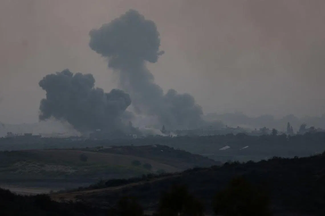 Smoke rises over Gaza, as seen from Israel's border with Gaza, in southern Israel October 28, 2023. REUTERS/Amir Cohen