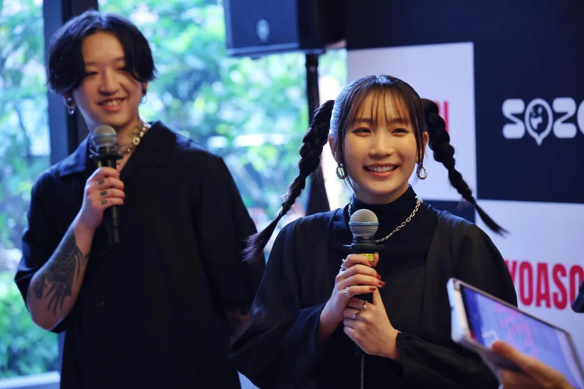 J-pop duo Yoasobi - composer Ayase (left) and Ikura (right) - attend a press conference on Jan 12, 2024, a day after their sold-out first solo show in Singapore.