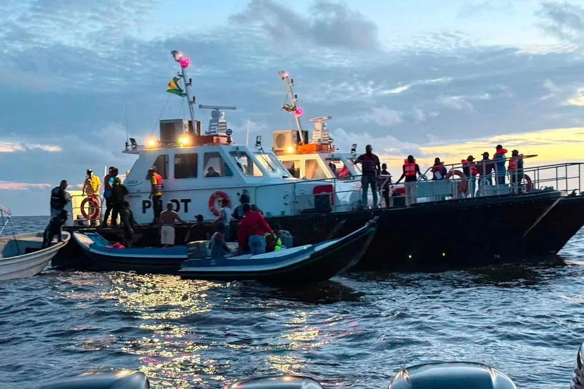 Rescue efforts progress after MV Barima, a ferry carrying people, capsized off the coast of Guyana in South America, in this handout image released on July 19, 2026. Bishop Juan Edghill/Handout via REUTERS