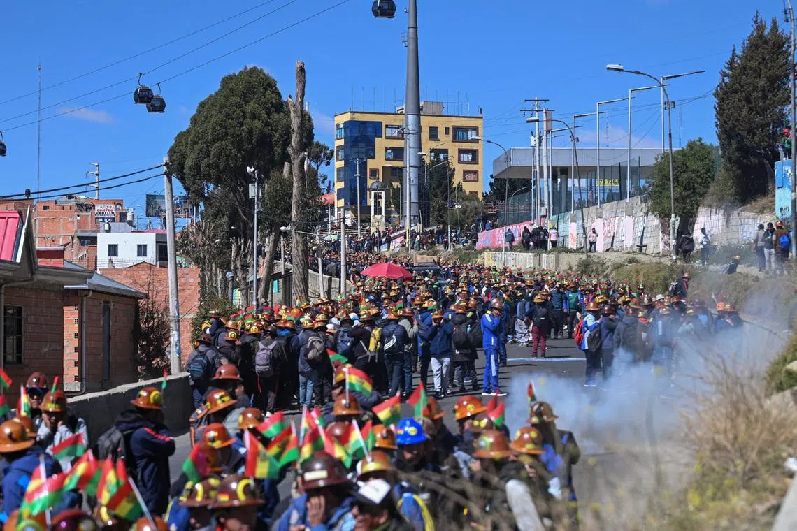 Bolivia miners clash with police, explosions rock La Paz as unrest grows