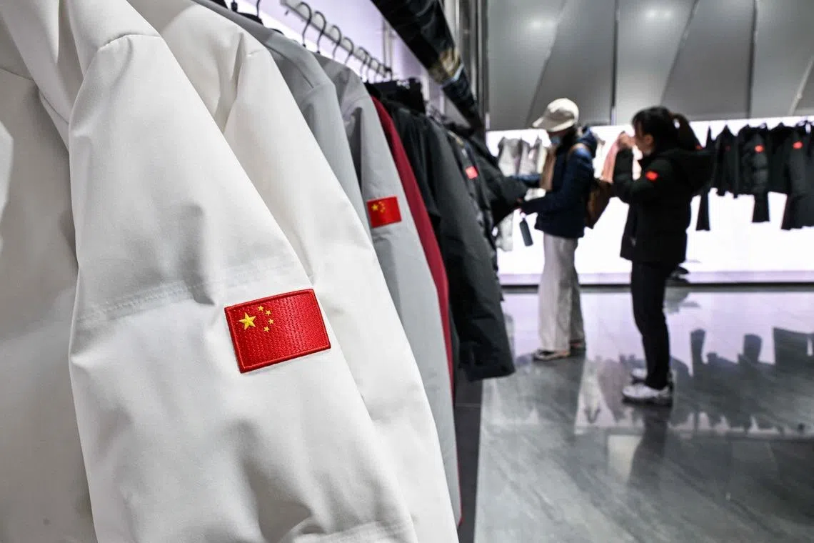Customers browse in an Anta store on Jan 27.