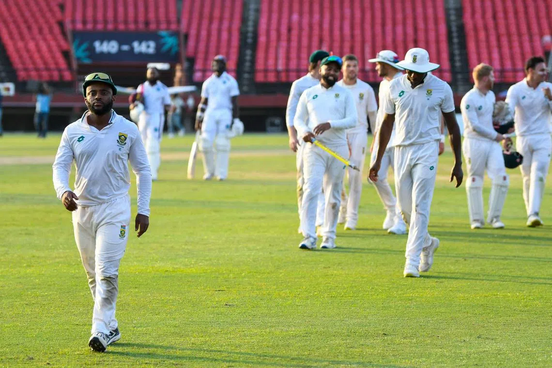 South Africa cricket captain Temba Bavuma with his team after winning on day 3 of the 2nd Test against West Indies at Guyana National Stadium in Providence on Aug 17, 2024.