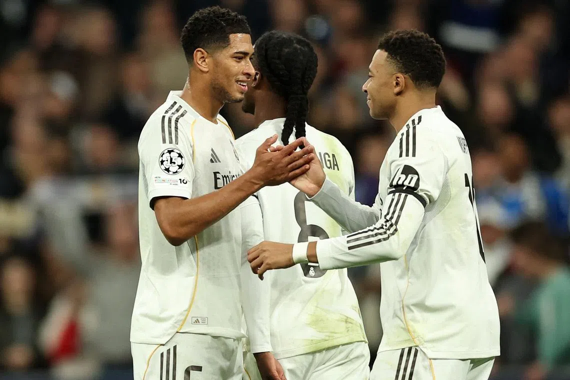 Soccer Football - UEFA Champions League - Real Madrid v AS Monaco - Santiago Bernabeu, Madrid, Spain - January 20, 2026 Real Madrid's Kylian Mbappe celebrates scoring their second goal with Jude Bellingham REUTERS/Violeta Santos Moura