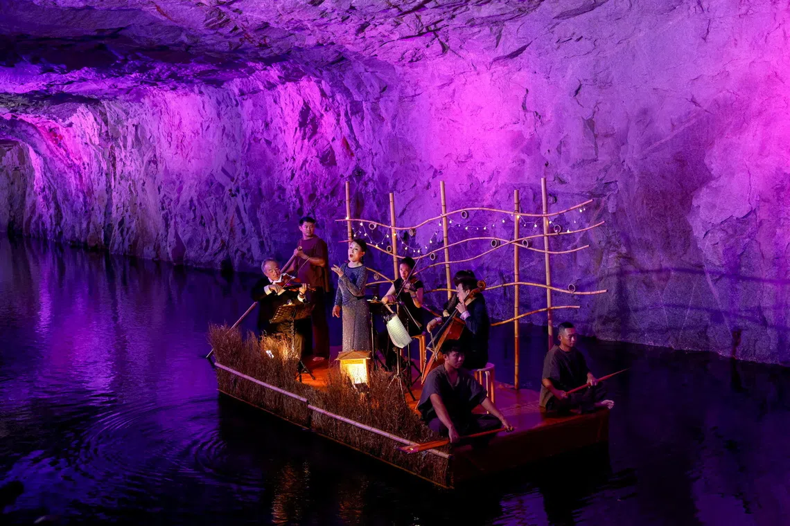 In a photo released on Oct 22, 2025 showing Taiwanese opera singer Wei Hai-min performing on a raft inside the Zhaishan Tunnel during the annual Kinmen Tunnel Music Festival in Kinmen, Taiwan.