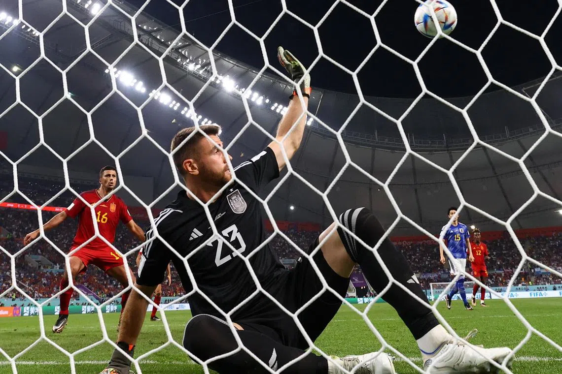 Spain's Unai Simon in action before Japan's Ao Tanaka scores their second goal during their World Cup Group E match at the Khalifa International Stadium, which the Samurai Blue won 2-1.