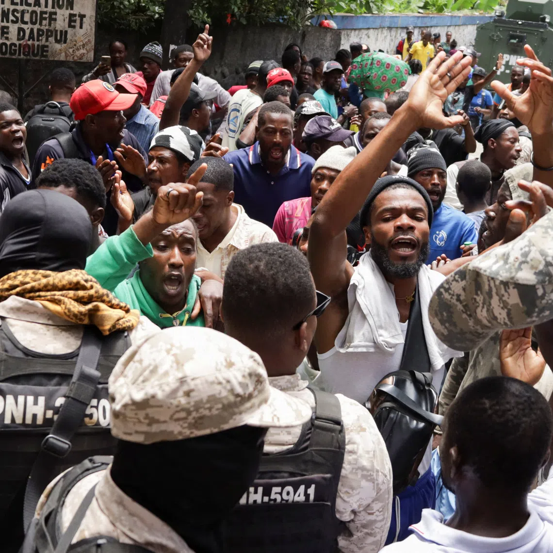 Residents protest against insecurity after a fatal overnight raid by an armed gang, on the outskirts of Port-au-Prince, in Kenscoff, Haiti, August 24, 2026. REUTERS/Fildor Pq Egeder