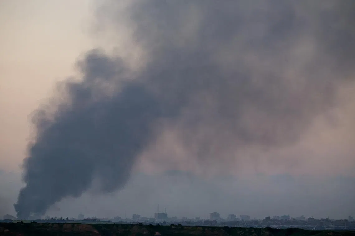 Smoke rises over Gaza, amid the ongoing conflict between Israel and the Palestinian Islamist group Hamas, as seen from Israel, February 20, 2024. REUTERS/Susana Vera