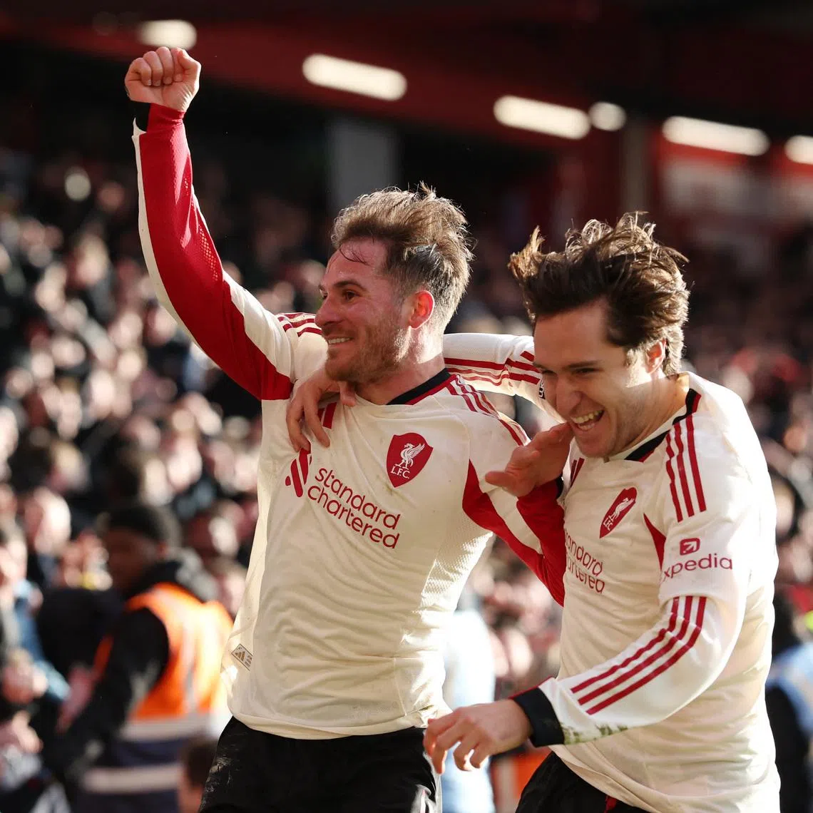 Soccer Football - Premier League - Nottingham Forest v Liverpool - The City Ground, Nottingham, Britain - February 22, 2026 Liverpool's Alexis Mac Allister celebrates scoring a goal that was later disallowed with Federico Chiesa REUTERS/Chris Radburn