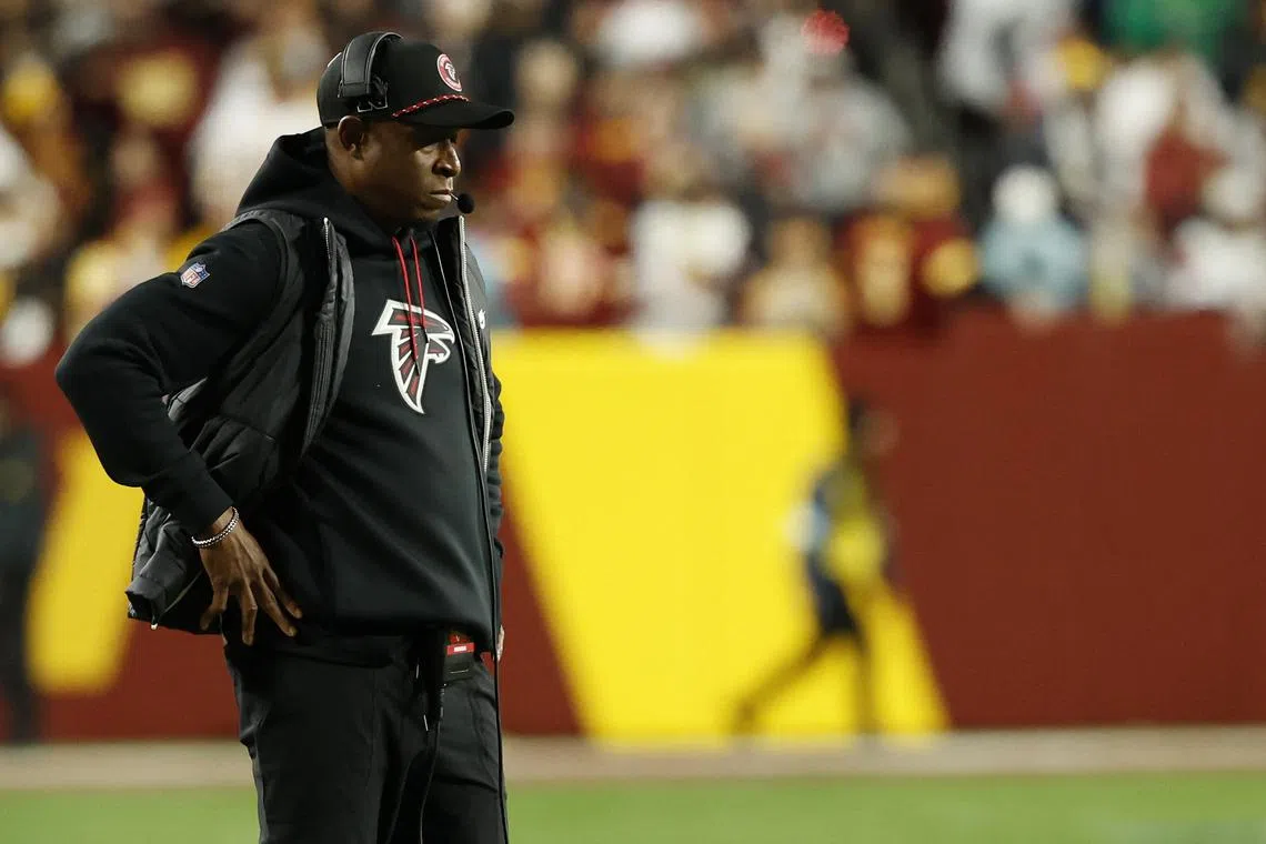 FILE PHOTO: Dec 29, 2024; Landover, Maryland, USA; Atlanta Falcons head coach Raheem Morris looks on from the sidelines against the Washington Commanders during the third quarter at Northwest Stadium. Mandatory Credit: Geoff Burke-Imagn Images/File photo