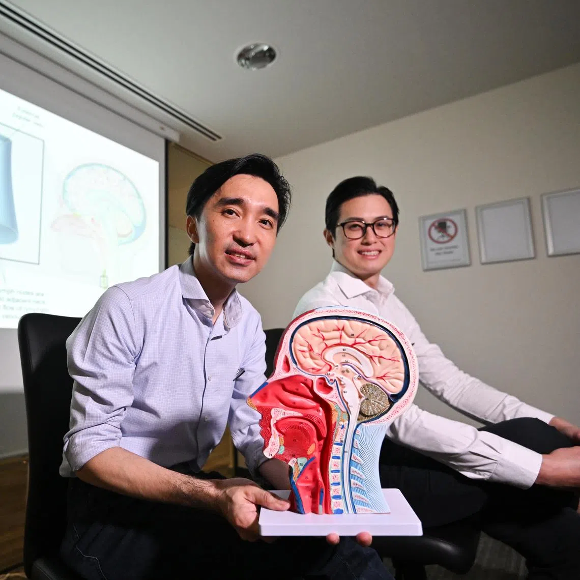 Clinical Assistant Professor Vincent Tay (left) and Clinical Assistant Professor Jeremy Sun hope to recruit an additional six patients this year as part of the trial’s next phase.