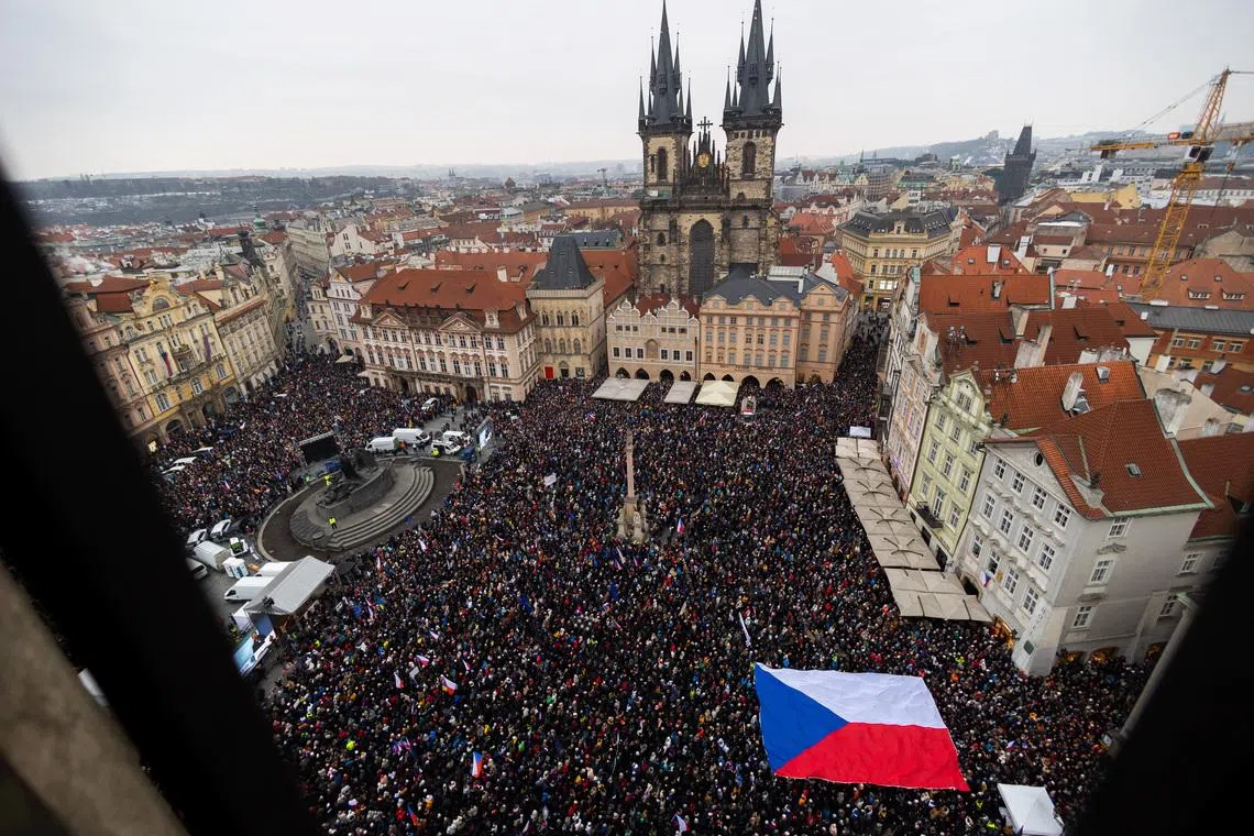 People take part in a rally in support of Czech President Petr Pavel, organised by Million Moments for Democracy group in reaction to dispute between President Pavel and Czech Foreign Minister and Motorists chair Petr Macinka, in Prague, Czech Republic, February 1, 2026. REUTERS/Eva Korinkova