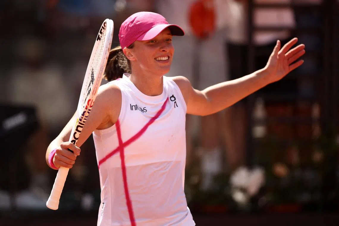 Poland's Iga Swiatek celebrates after winning her quarter-final match against Madison Keys at the Italian Open.