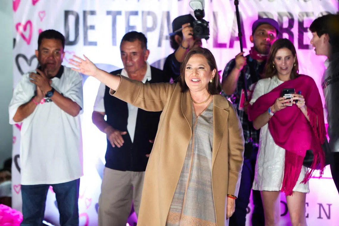 FILE PHOTO: Mexico's opposition presidential candidate Xochitl Galvez waves during a visit to her hometown Tepatepec to close her campaign activities, ahead of the June 2 general election, in Mexico, May 29, 2024. REUTERS/Luis Cortes/File Photo