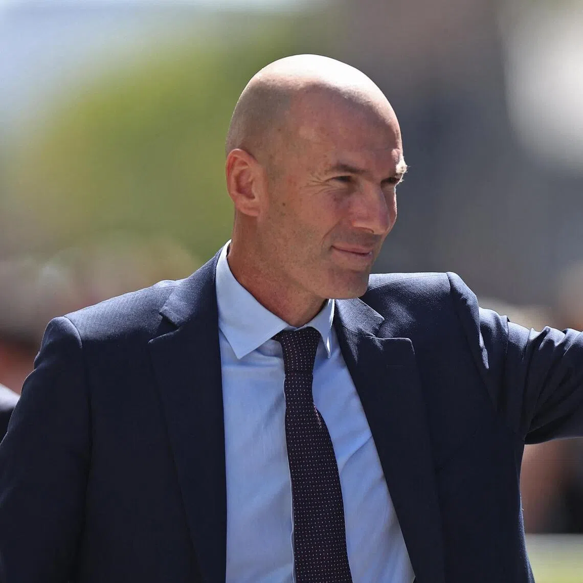 Zinedine Zidane waving at fans as he was unveiled as the newly appointed head coach of France at the French Football Federation headquarters in Paris on July 28.