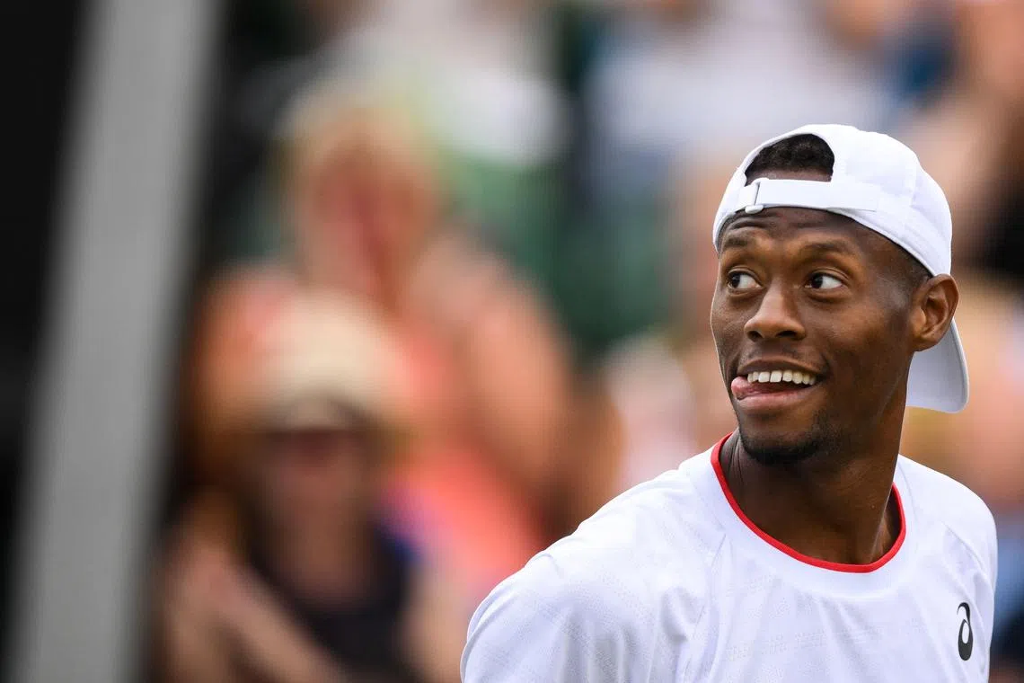 US player Christopher Eubanks reacts as he plays against Greece's Stefanos Tsitsipas during their men's singles tennis match on the eighth day of the 2023 Wimbledon Championships at The All England Tennis Club in Wimbledon, southwest London, on July 10, 2023. (Photo by Daniel LEAL / AFP) / RESTRICTED TO EDITORIAL USE