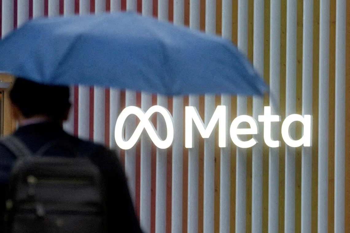 FILE PHOTO: The logo of Meta Platforms is seen in Davos, Switzerland, May 22, 2022. REUTERS/Arnd Wiegmann/File Photo