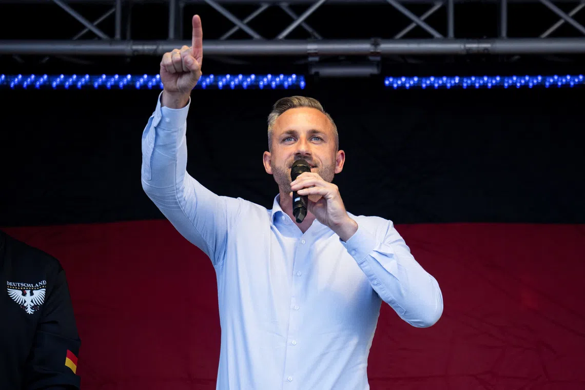 Ulrich Siegmund, top candidate of the far-right Alternative for Germany (AfD) party, speaks on stage during a campaign rally ahead of Germany's Saxony-Anhalt state election, in Naumburg, Germany August 24, 2026. REUTERS/Annegret Hilse