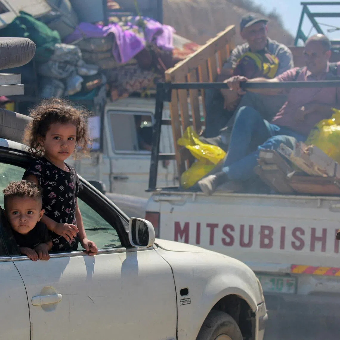 Palestinians heading south with their belongings, in Gaza on Oct 1.