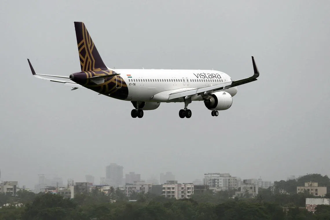 FILE PHOTO: A Vistara Airbus A320 passenger aircraft prepares to land at Chhatrapati Shivaji International airport in Mumbai, India, July 11, 2018. REUTERS/Francis Mascarenhas/File Photo