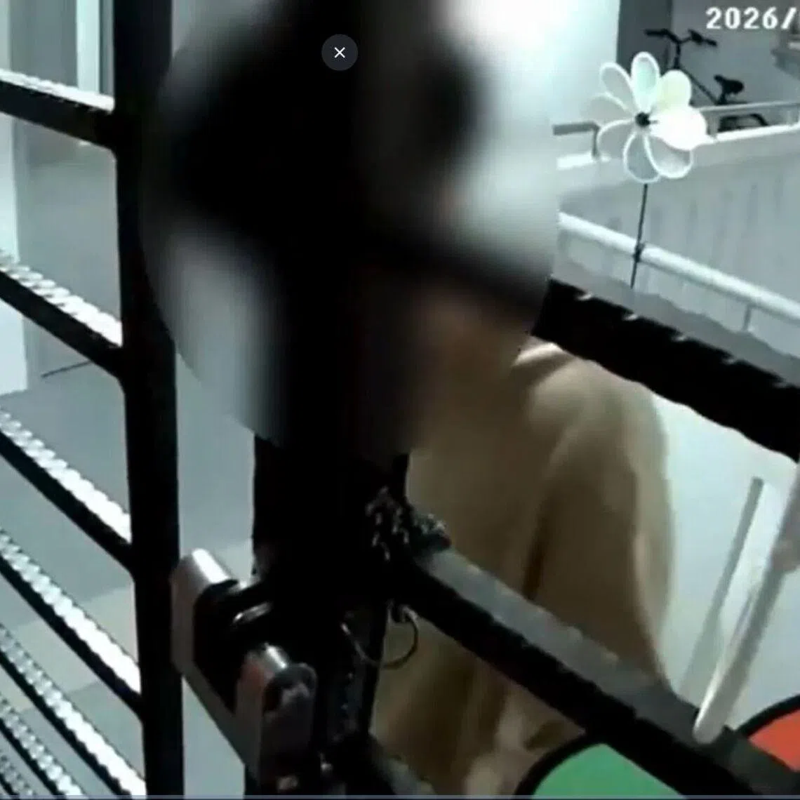 The man, who was seen loitering outside a Sengkang HDB flat for close to half an hour, has been referred to the Health Sciences Authority.