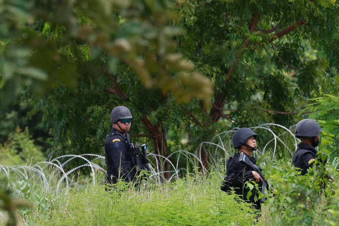 Thai rangers patrol along the Thai-Cambodian border at Ban Nong Ya Kaeo in Sa Kaeo province, Thailand, Sept 19, 2025. 