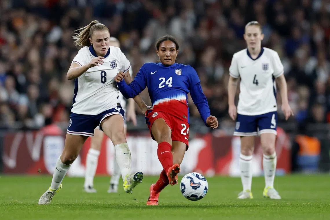 FILE PHOTO: Soccer Football - International Friendly - Women - England v United States - Wembley Stadium, London, Britain - November 30, 2024 England's Georgia Stanway in action with United States' Yazmeen Ryan Action Images via Reuters/Peter Cziborra/File Photo