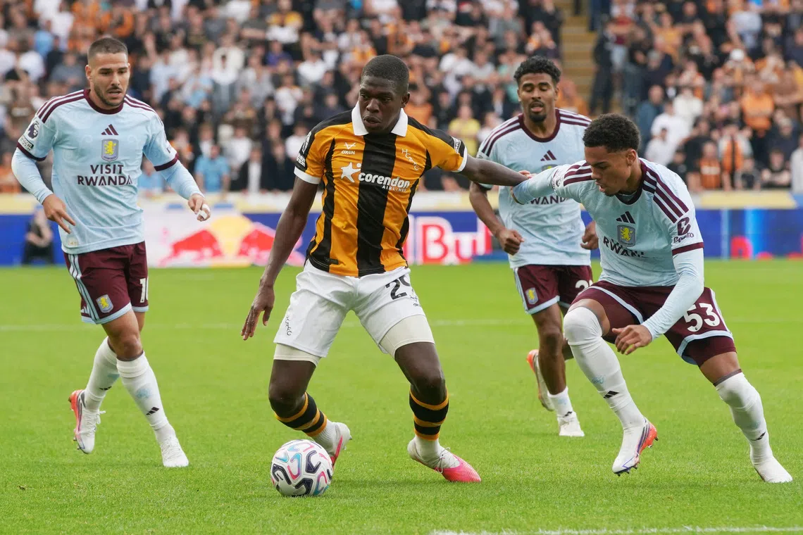 Soccer Football - Premier League - Hull City v Aston Villa - MKM Stadium, Hull, Britain - September 5, 2026 Hull City's Lucas Gourna-Douath in action with Aston Villa's George Hemmings REUTERS/Ian Hodgson