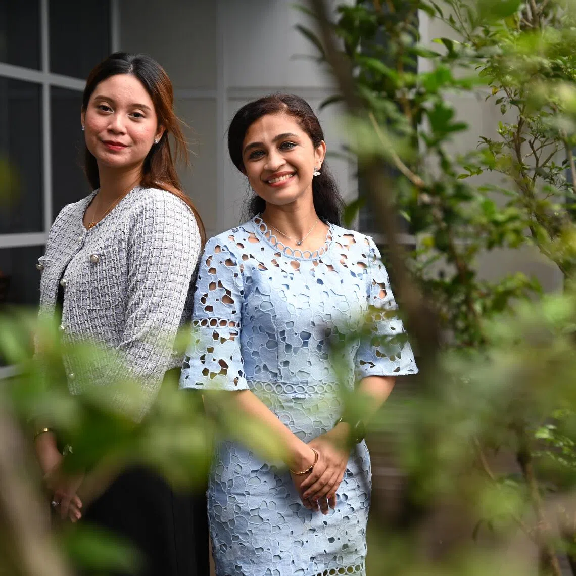 (From left) Shazwani Sazali and Anu Mary Abraham were offered scarless thyroid surgery which would avoid a visible neck scar.