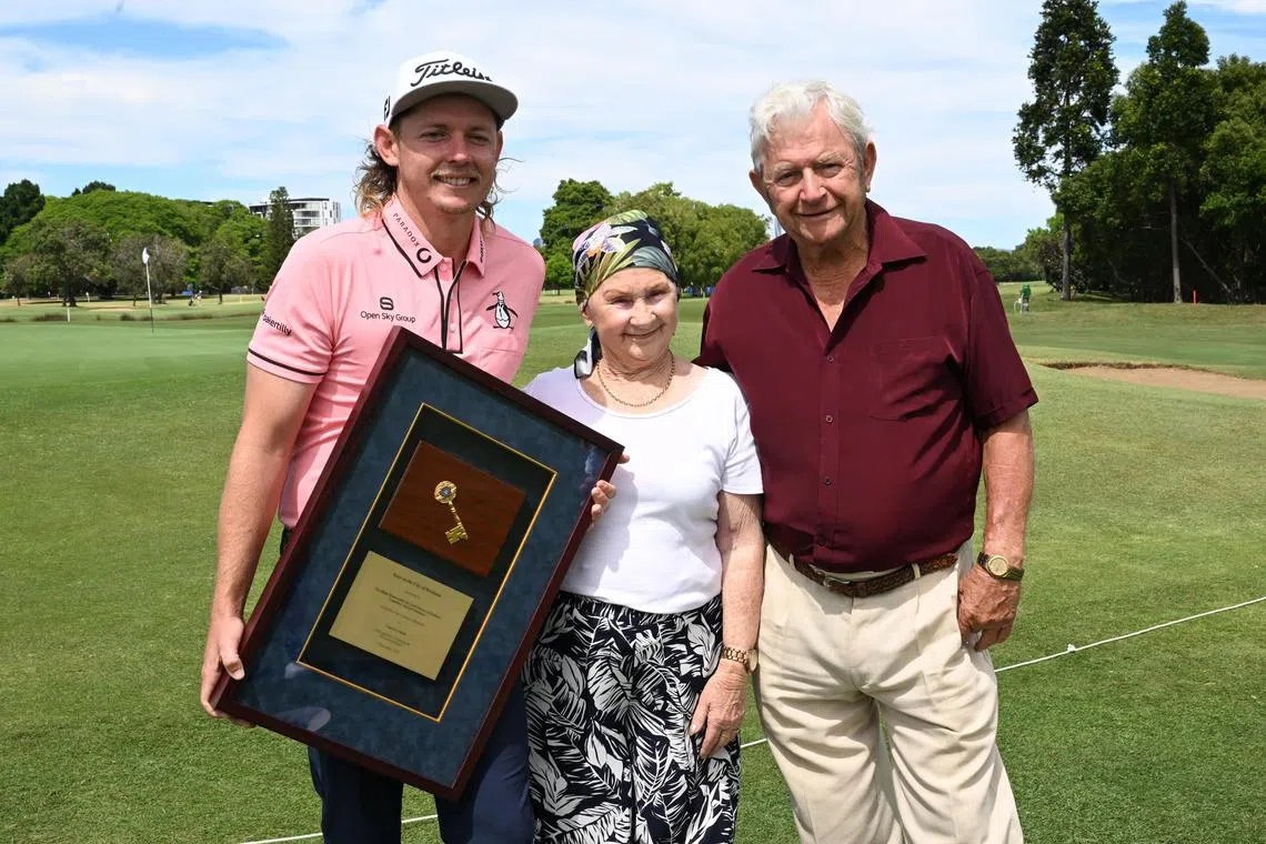 Australian golfer Cameron Smith poses with his grandparents Carol and Eric after he was presented with the Keys to the city of Brisbane on Tuesday during a presentation ahead of the 2022 Australian PGA Championship.