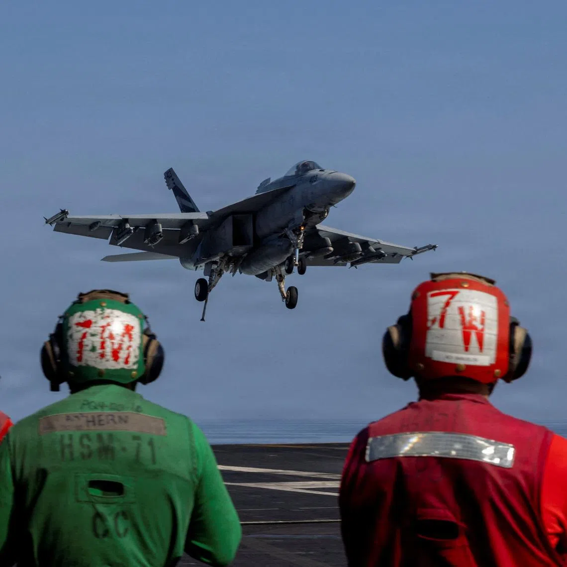 An F/A-18E Super Hornet prepares to make an arrested landing on the flight deck of the U.S. Navy Nimitz-class aircraft carrier USS Abraham Lincoln in support of the Operation Epic Fury attack on Iran from an undisclosed location March 2, 2026.  U.S. Navy/Handout via REUTERS
