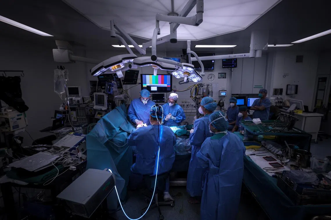 PIXGENERIC
Can be used for related stories as generic pictures AFTER ORIGINAL STORY IS PUBLISHED.

An patient undergoing a surgery in an operating theatre at National University Hospital, 12 Jan 2022.