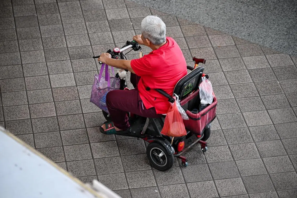 ST20240213_202422986384 Kua Chee Siong/ pixbud2024/ Generic pix of an elderly woman in her personal mobility device (PMD) at Toa Payoh central station on Feb 13, 2024.
Generic photos for Budget 2024.